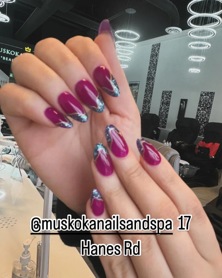 Berry nails with blue glitter French tips by Muskoka Nails & Spa